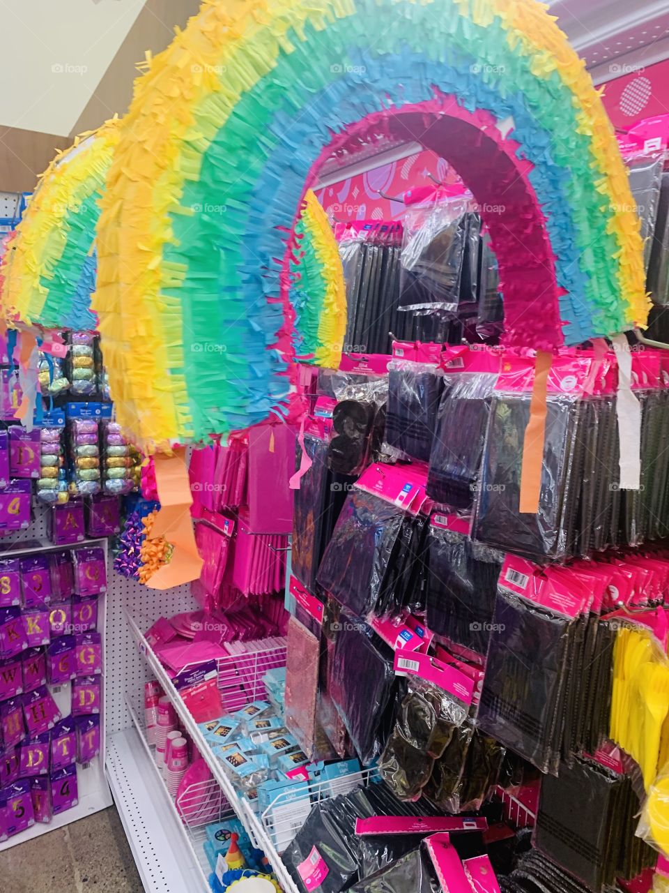 Rainbow piñatas at the party store 