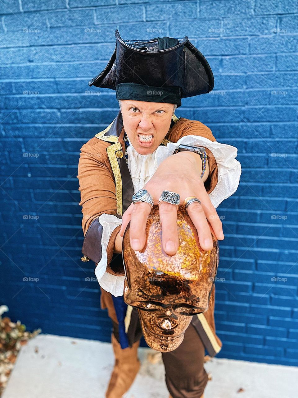 Woman dressed as pirate captain, Halloween family costumes, dressed up as a pirate, playing pirates 