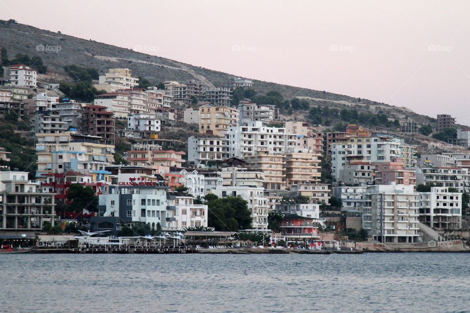 Evening in the resort town of Saranda. Extensive development has led to the town expanding rapidly along the southern Albanian coast, although a lack of funds has meant that many buildings remain unfinished.