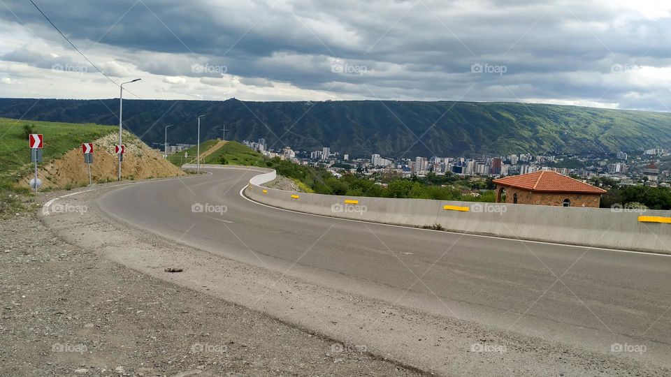 mountain and city