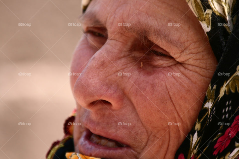 woman closeup face eyes by kuzeytac