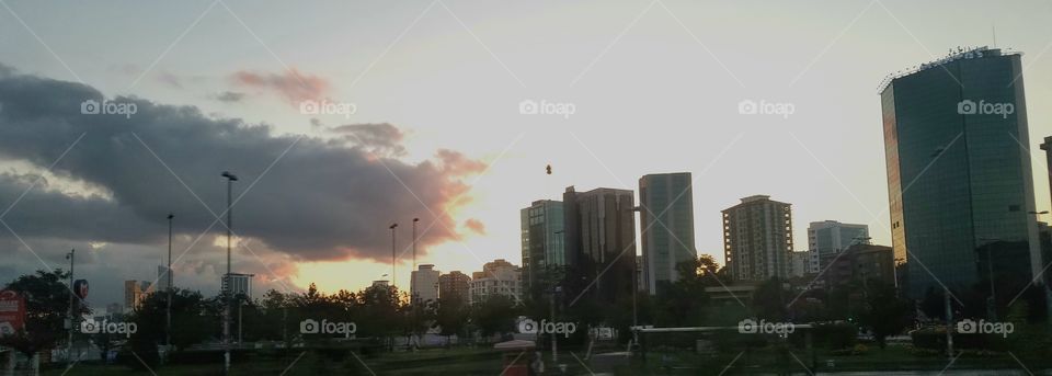 sunset over some high rise buildings in Ankara Turkey