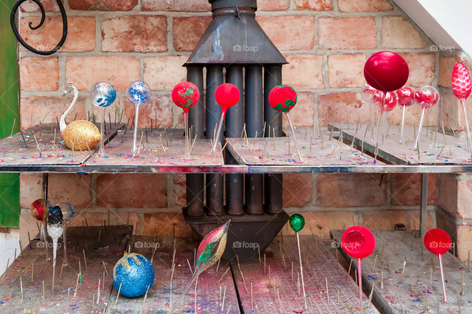 Christmas baubles left to dry and for hardening on stove.