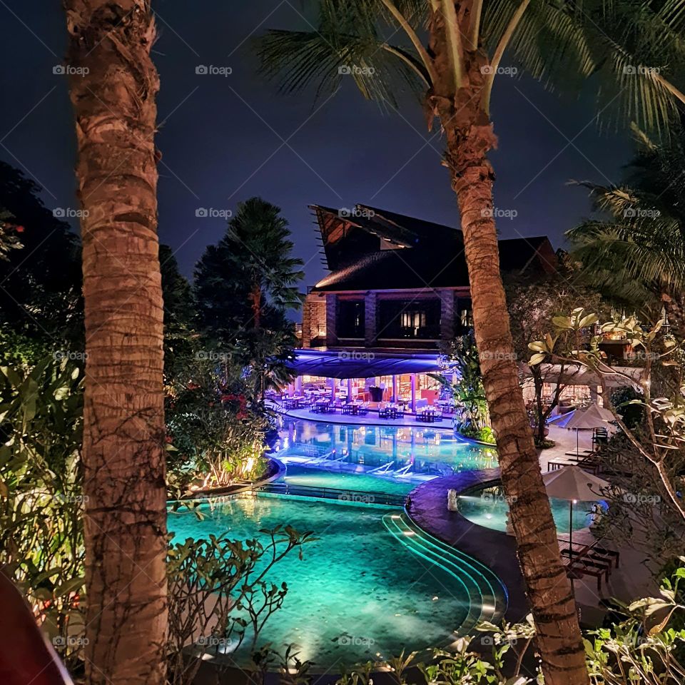 restaurant and swimming pool in hotel - night