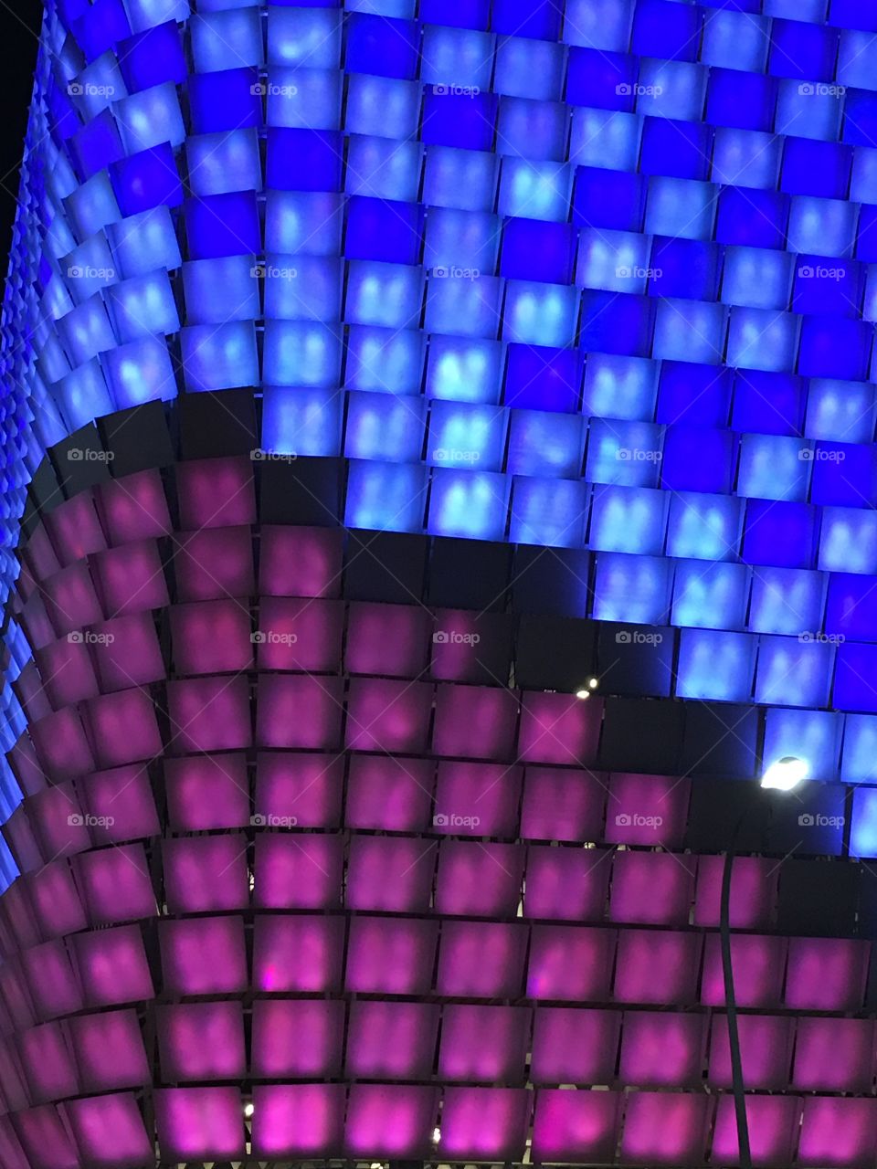 Neon lights building in rundell mall in Adelaide south Australia completely lit up in neon lights mosaic tiles which constantly change colours and patterns rubric