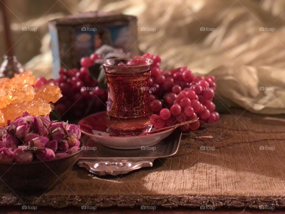 Iran has a rich culture of hospitality. Guests are welcome and considered as God's blessing. Tea, especially well-brewed Persian tea, is a popular drink offered to guests. There are some items that many Iranians might find nostalgic in this photo.