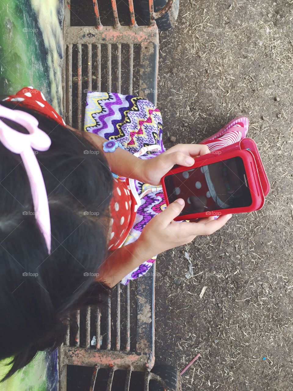 Kid using smartphone