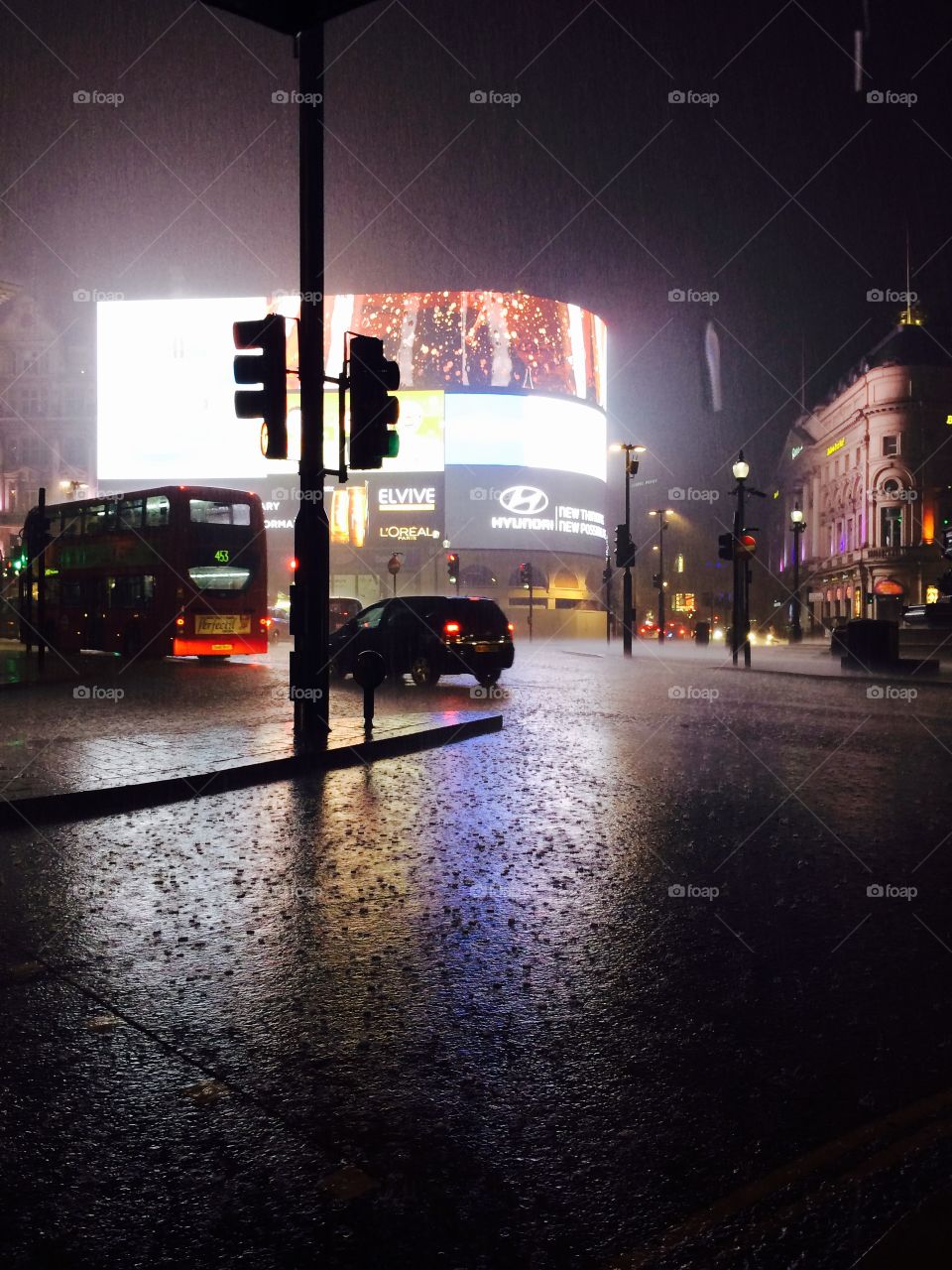 Piccadilly Circus by night. Rainy night in London