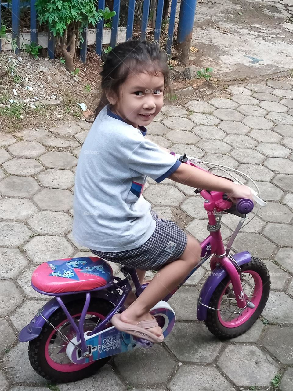 Little girl with bike