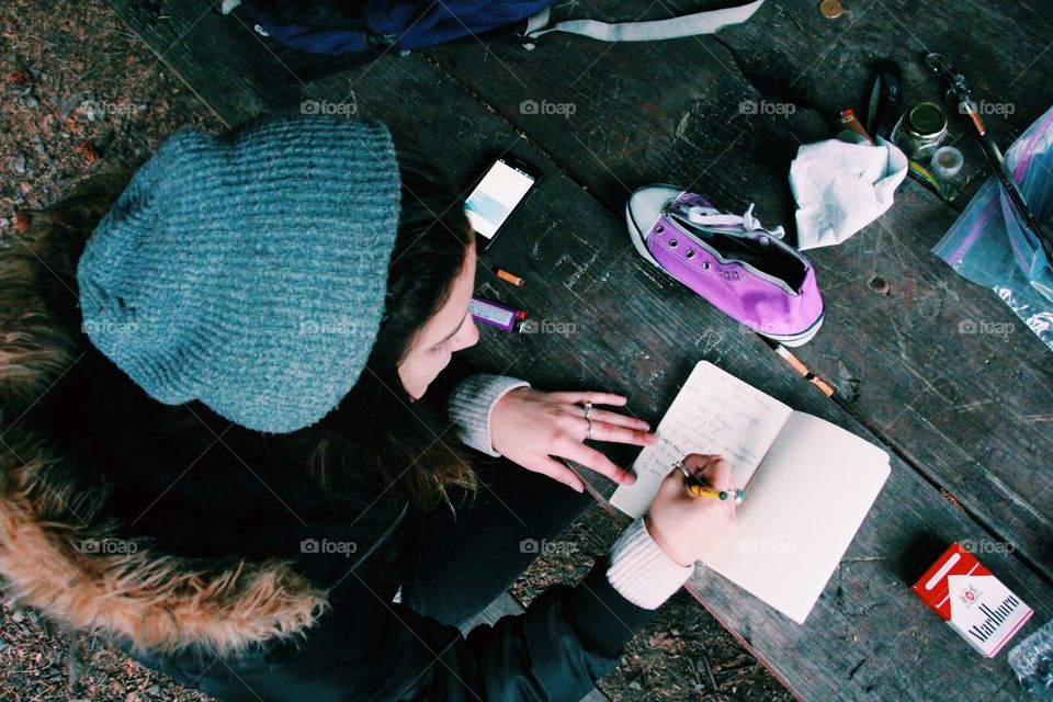 Making notes while camping in Alaska