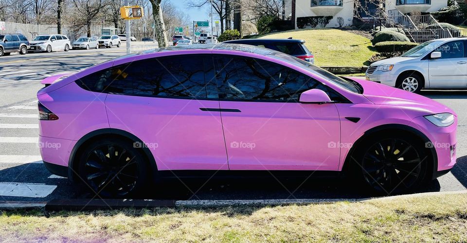 The world’s first hot pink Tesla Model 3. Hot pink and satin black is strikingly beautiful and eye catching. 