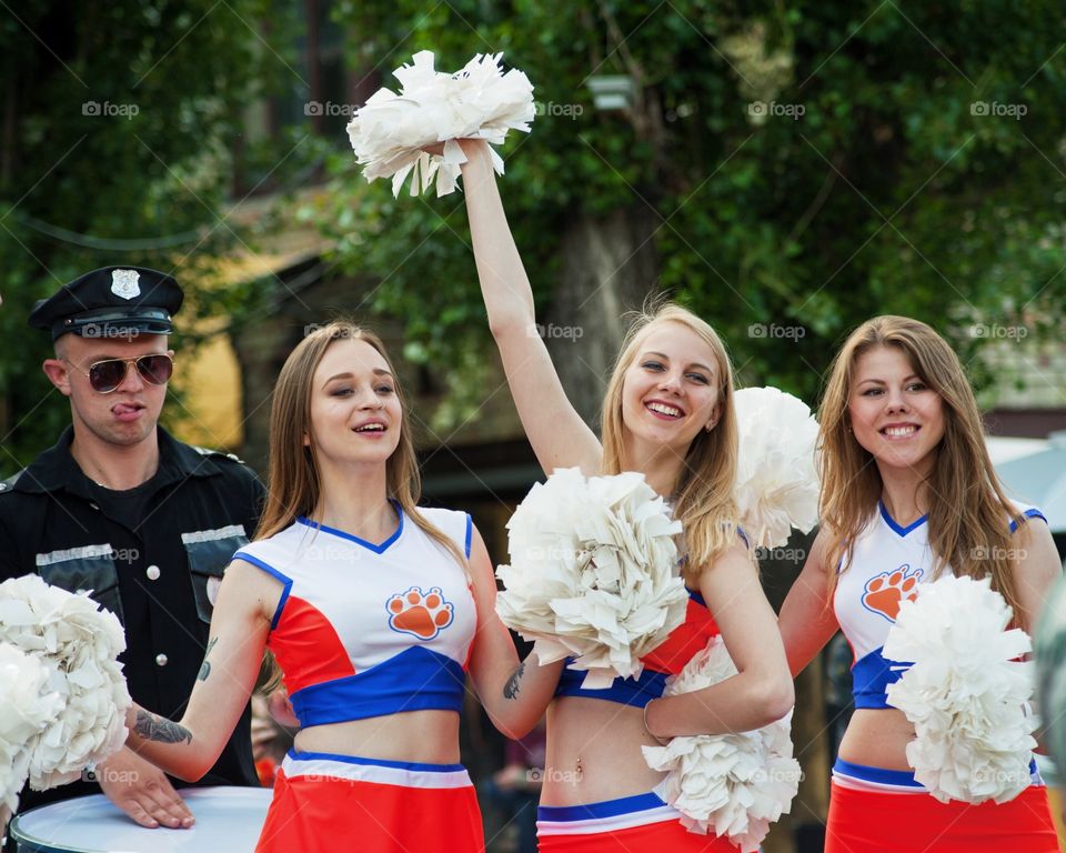 Group of cheerleaders standing together