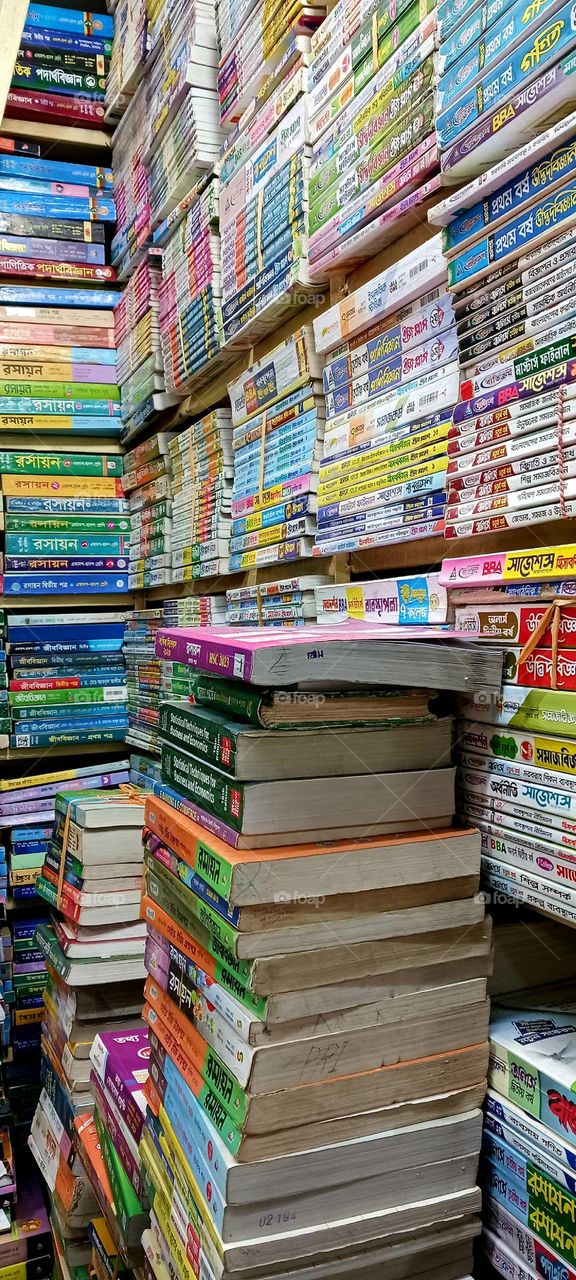 Secondhand bookstall at Nilkhet Book Market. Dhaka, Bangladesh.