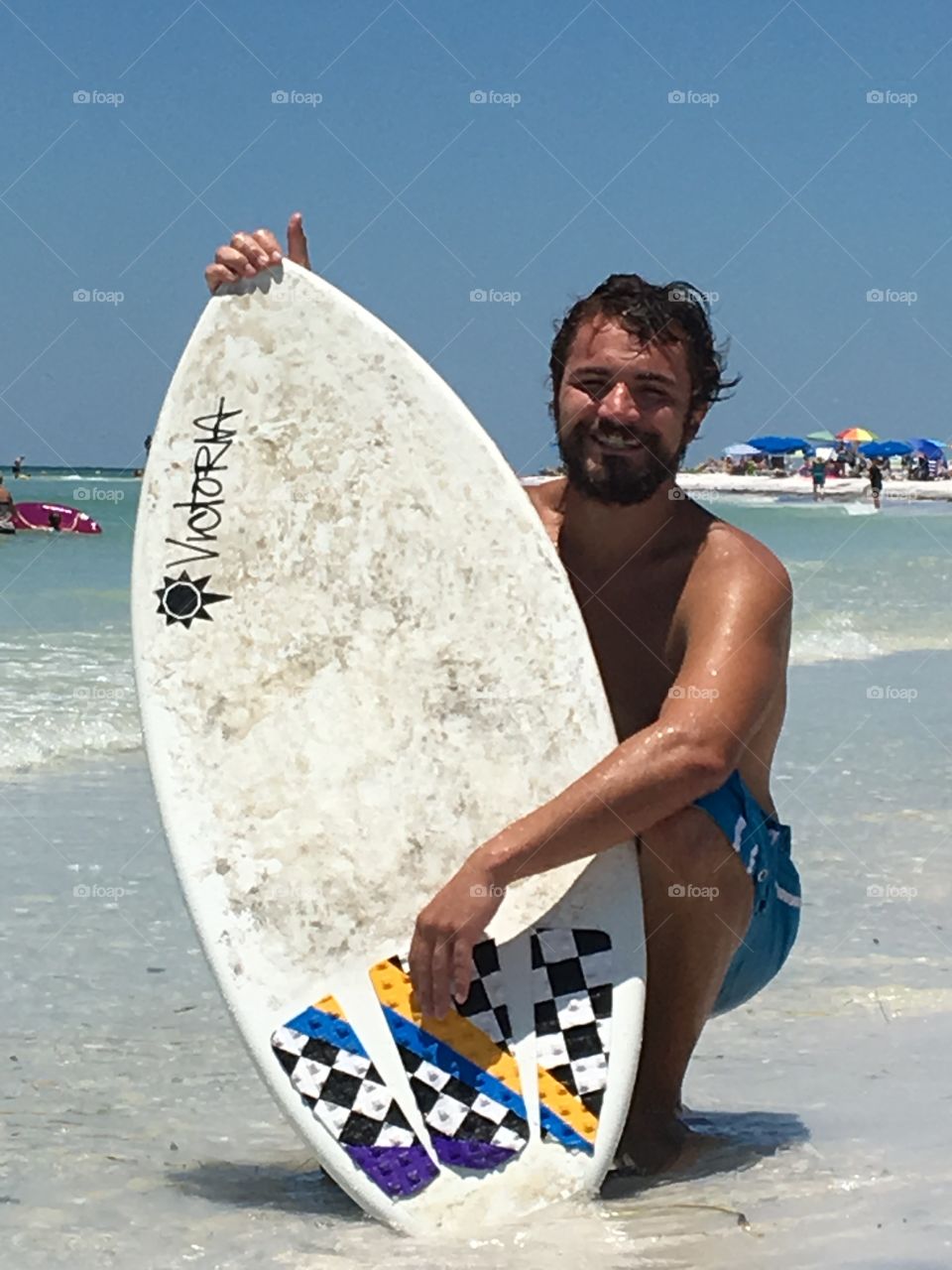 Skim board surfer