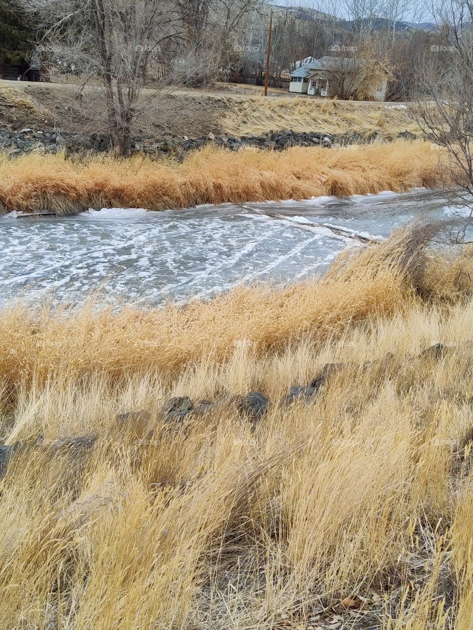 Frozen river. You can see the waves in the ice.