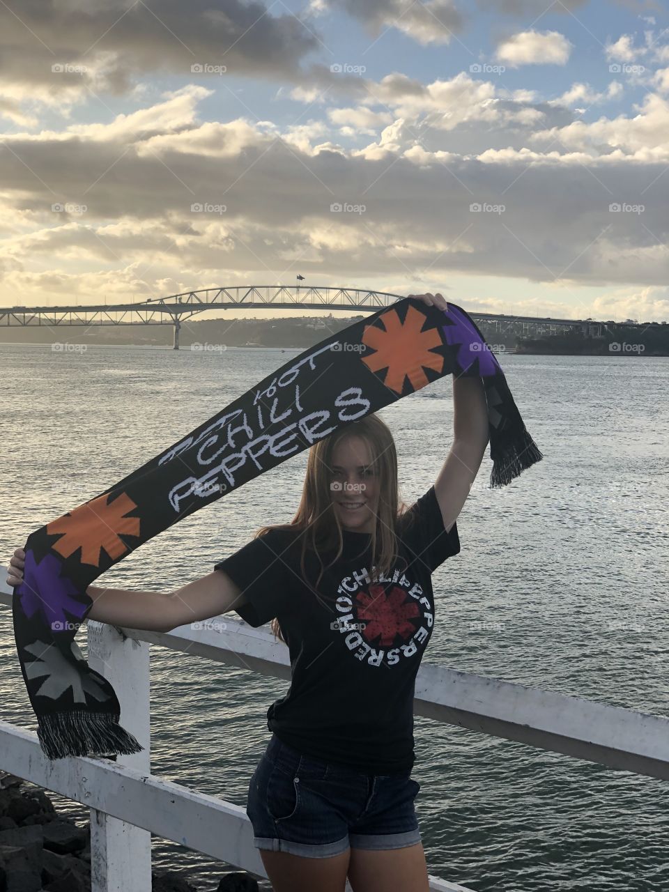 Here’s a photo of me posing in front of the Auckland harbour bridge ready for the Red hot chili pepper concert🌶