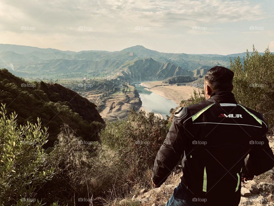 A biker riding in the mountains of Pakistan