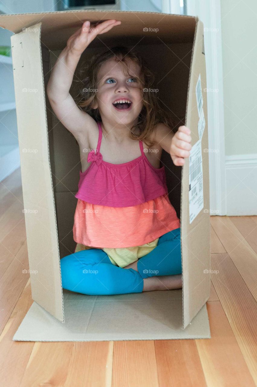 Close-up of girl in box