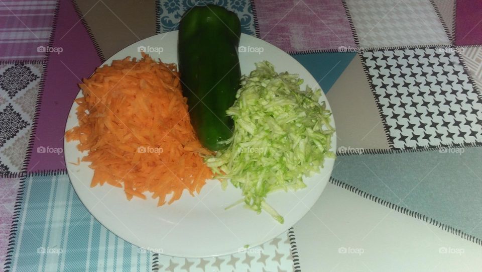 Pumpkins and carrots in a dish and pepper.