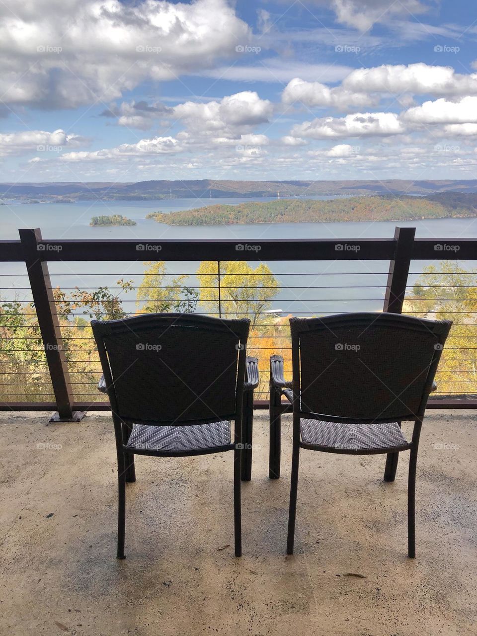 Above it all, looking over Lake Guntersville at the rolling foothills of the Appalachian mountains in autumn 