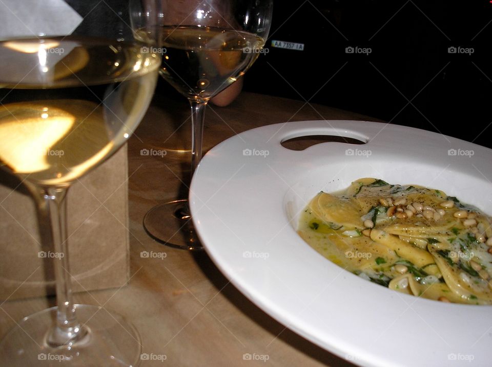 Dinner in Italian style with white wine