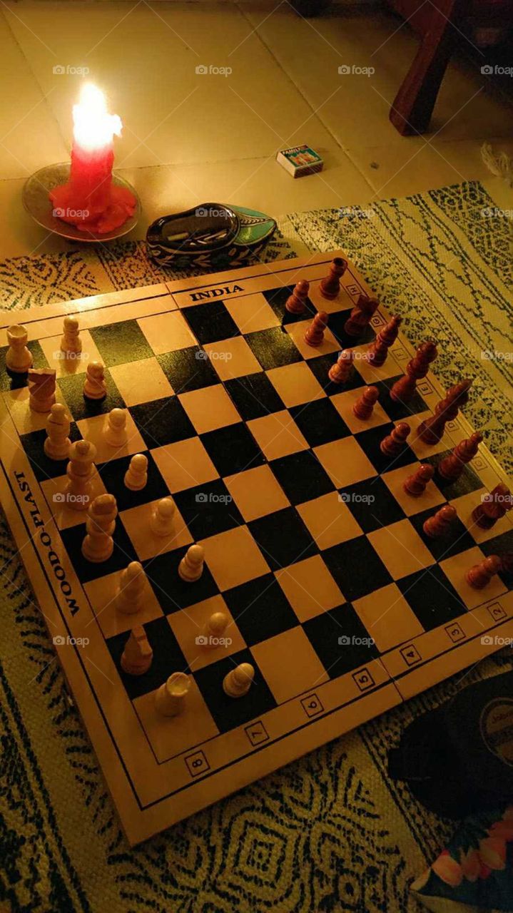Candle lit chess board