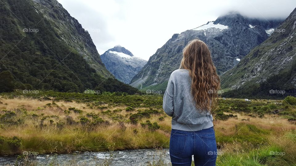 Young girl enjoying the mountains