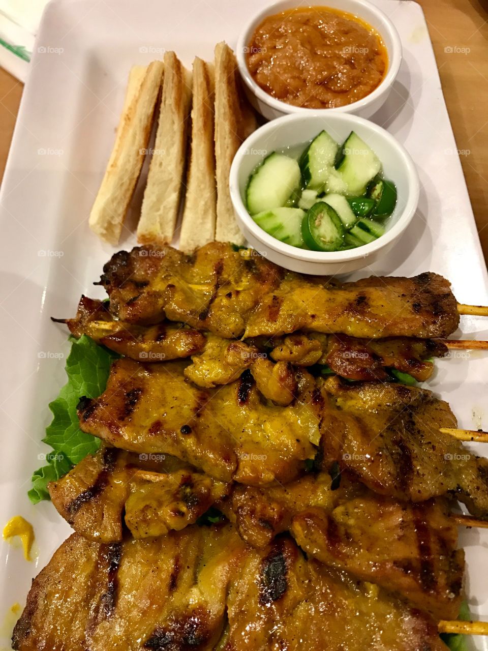 Satay chicken on a skewer 