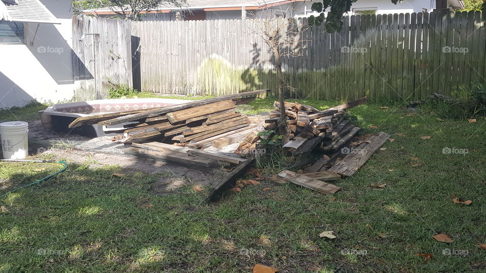 wood pile back yard lumber garbage