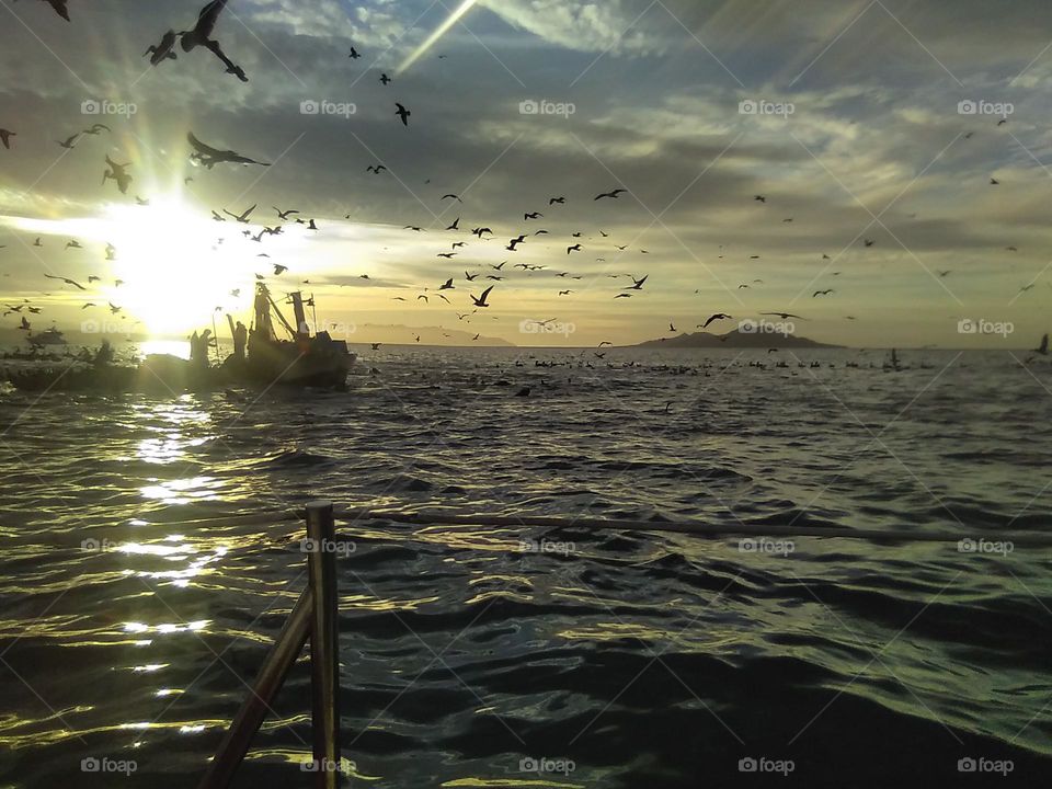 Fishermen At Sunrise