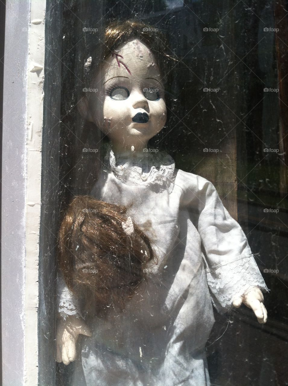 Creepy Antique Doll in the Window