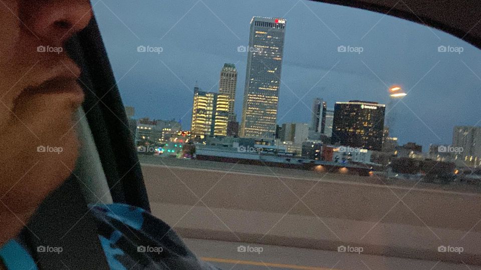 Traveling in motion down town Tulsa oklahoma passing the beautiful city. Romance by the Mayo hotel beautiful reminder we are blessed to be here and live here.