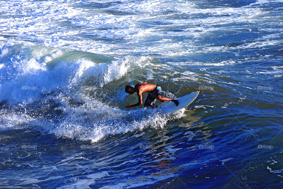 The waves and the surfer