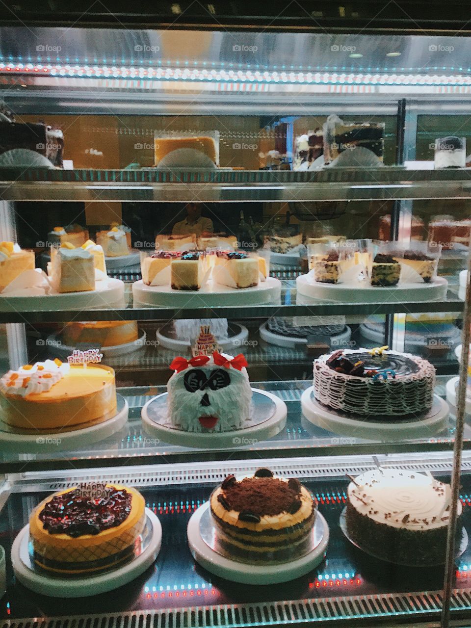 Different cakes displayed in a local cafe.
