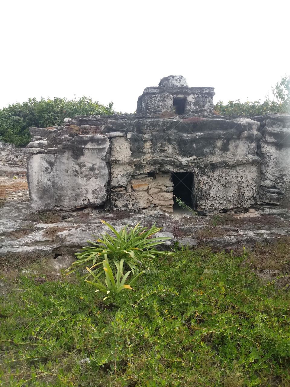 Taken off a stop made in Honduras building made of stone rock and clay 