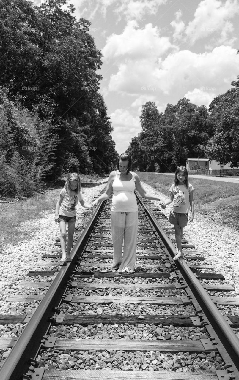 Holding daughters hand