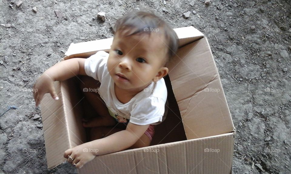 cute little baby girl in the box