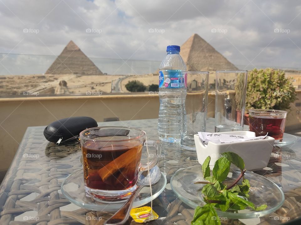 a great day in Great Giza Pyramids morning drinks coffee & and Egyptian tea with mint 
this is Egyp