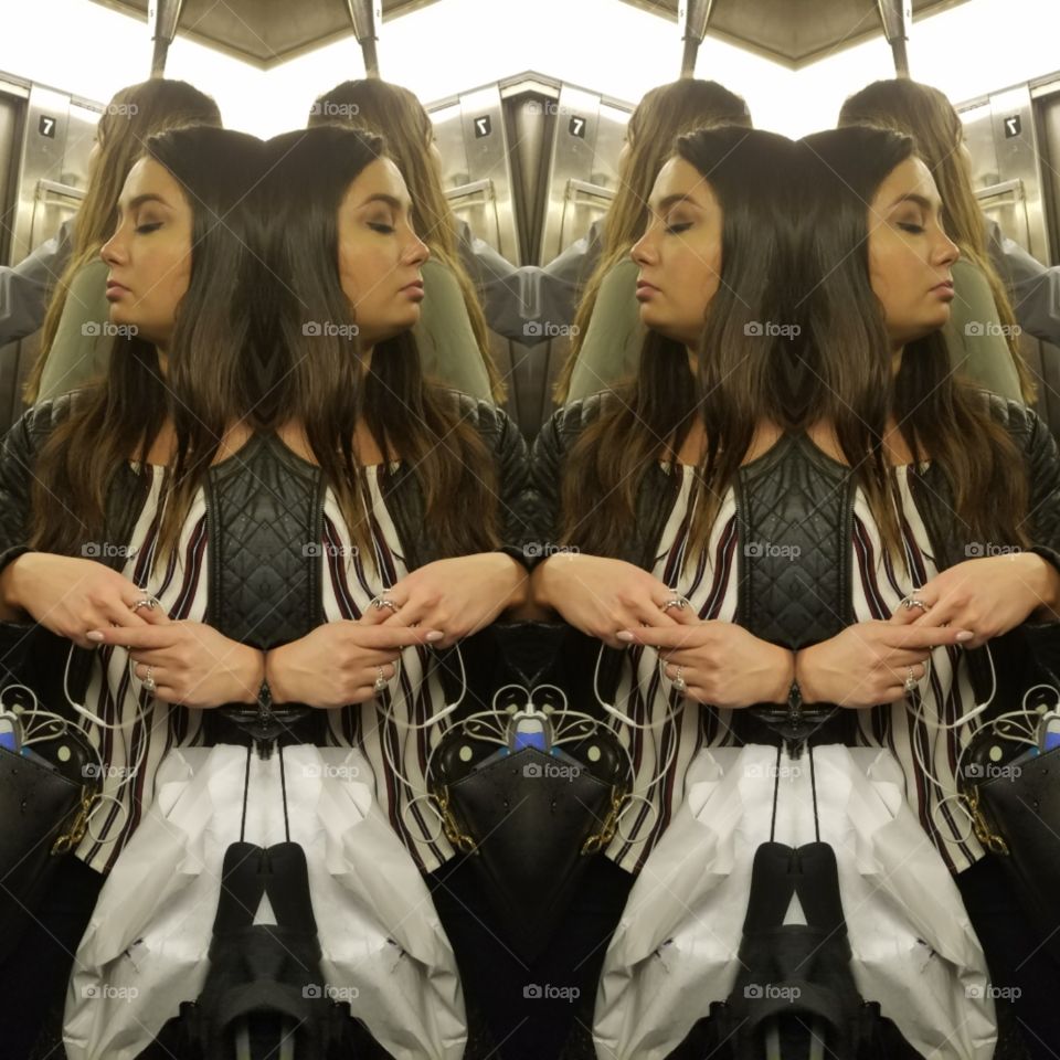 Girl Riding Subway in NYC Looking at her Phone. Photo Collage.