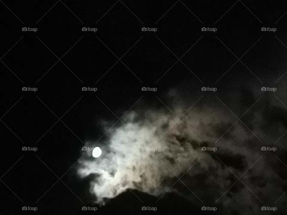 Moon through clouds