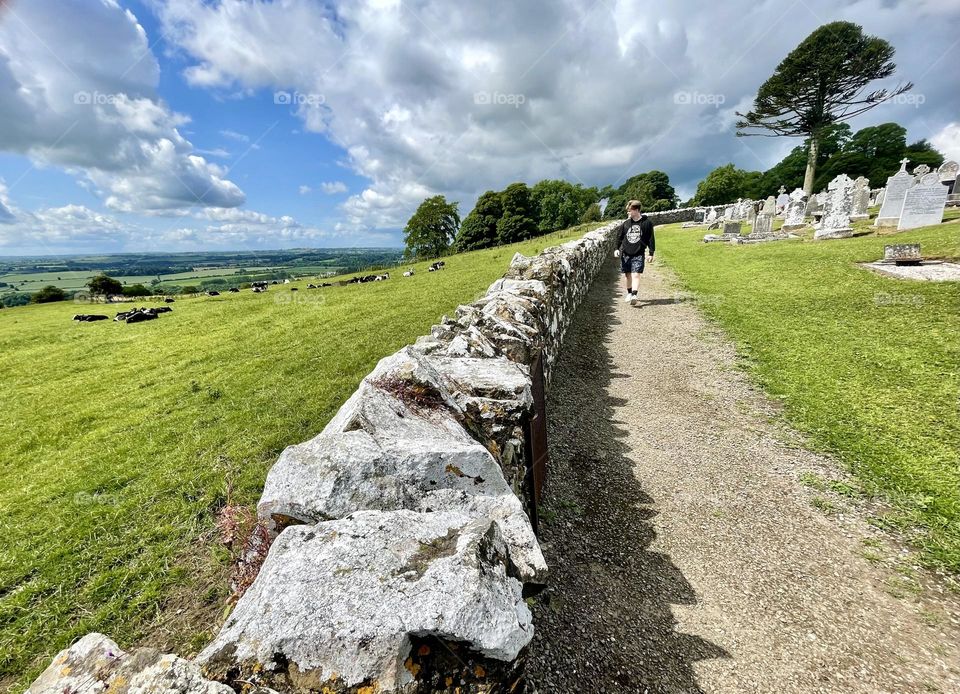 A stroll along an ancient Irish wall at the Hill of Slane, Co. Meath, Ireland.