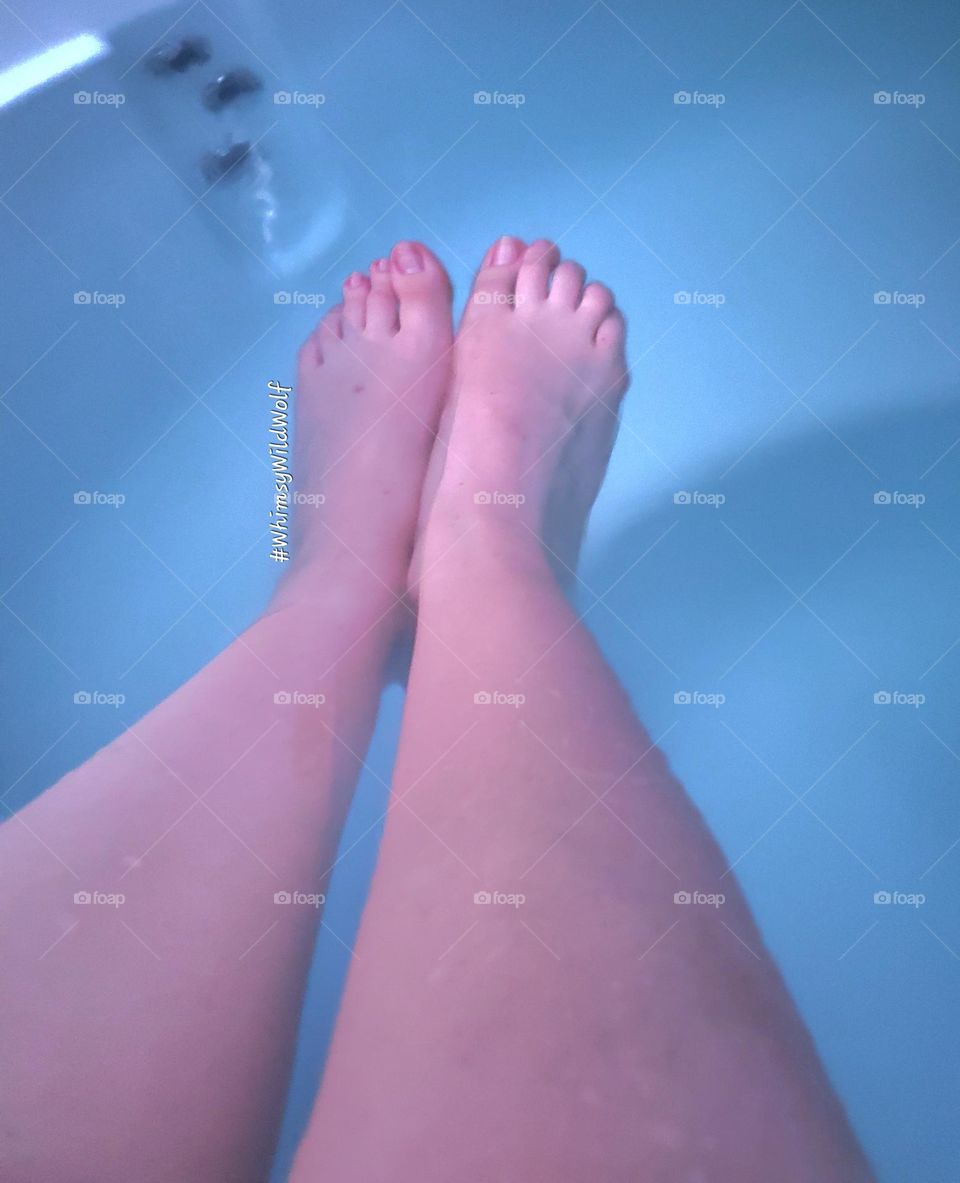 Resting in the water before nightfall. Enjoying the benefits of a bright, sunny day and the warm water of a hot tub.