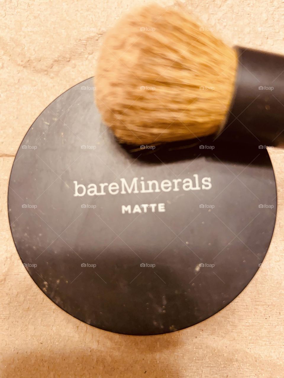 Bare Minerals Matte Foundation with Mini Brush. I always gravitate back to this foundation. It looks like just skin on, not like you are wearing makeup, and evens out my complexion. Some say you should not use powder as you get older, but I still do.