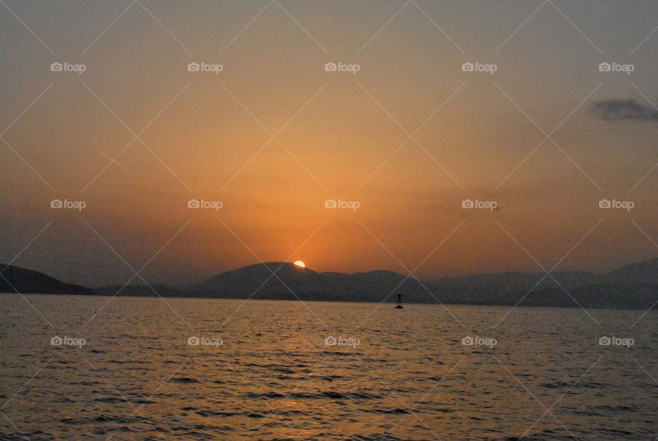 sunrise below mountain in greece