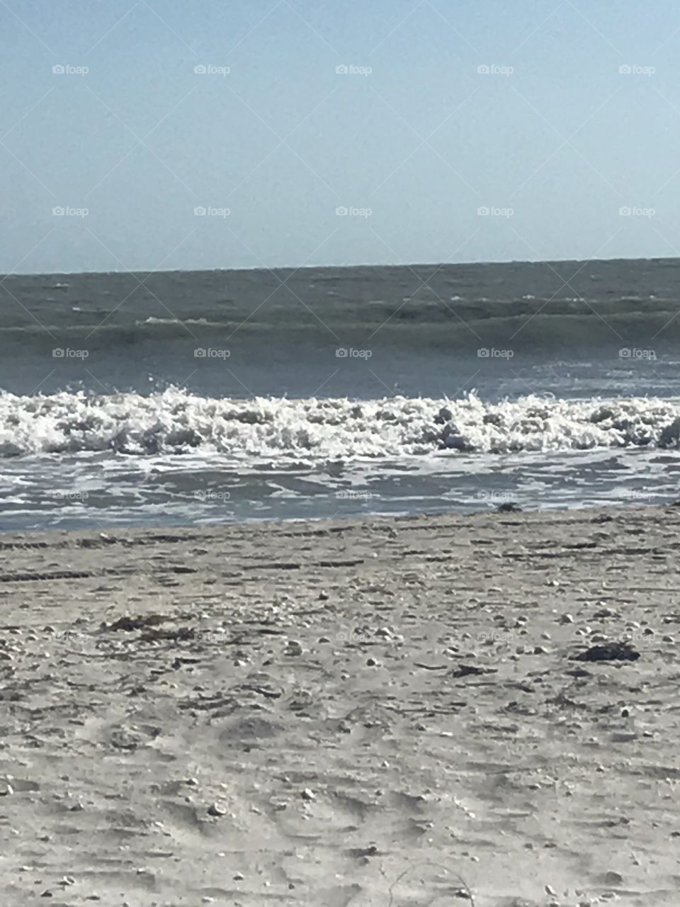 Beach waves ocean gulf sand water Florida Sanibel Island 
