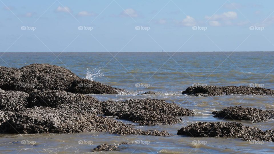 Little rocks at the sea