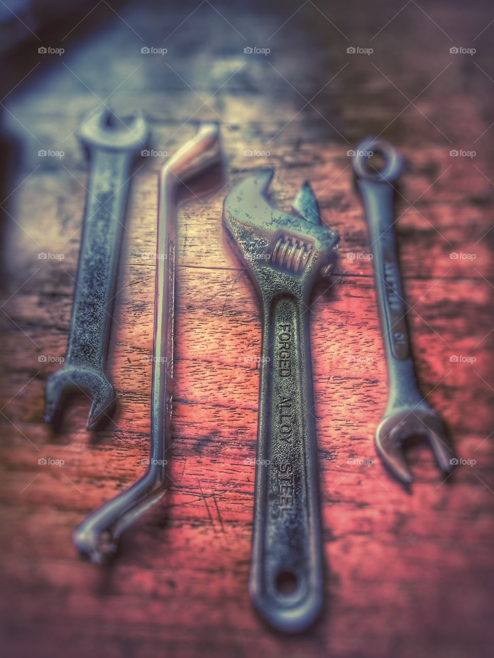 Spanner tools on wooden table