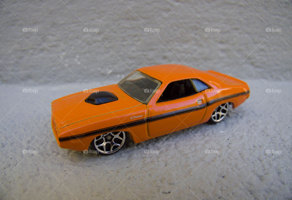 Miniature orange car