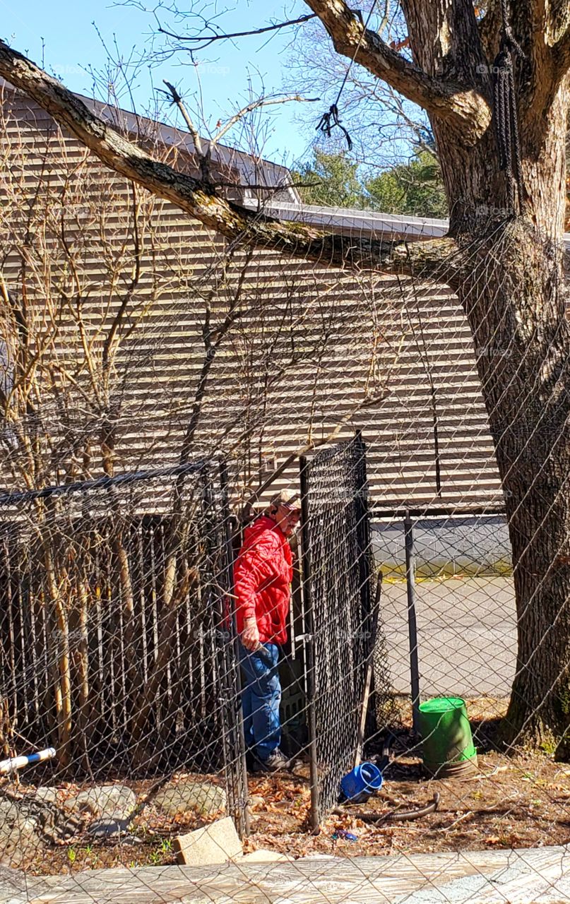 #stayathome - Home projects. Fixing old fences with tools, cooped up at home, confinement.