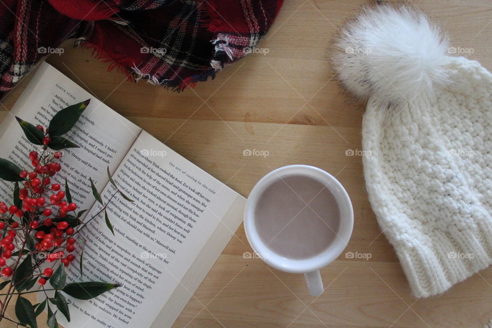 Cozy with cocoa and a good book on a cold winter day